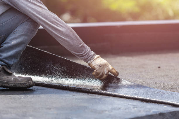 Professional Basement Waterproofing technician working in Newport, KY